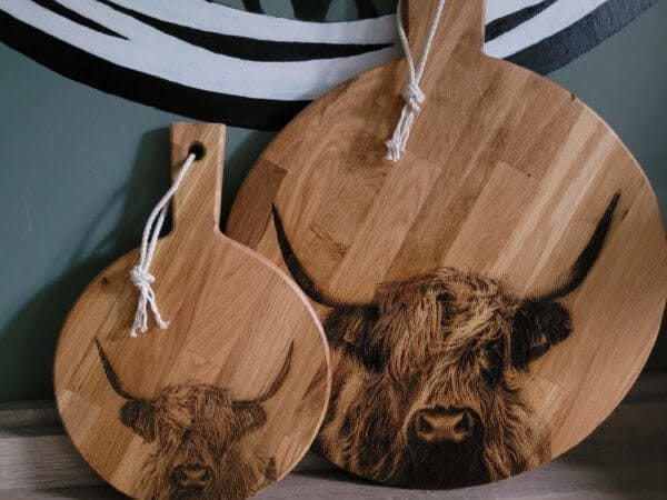 Borrelplank met Schotse Hooglander